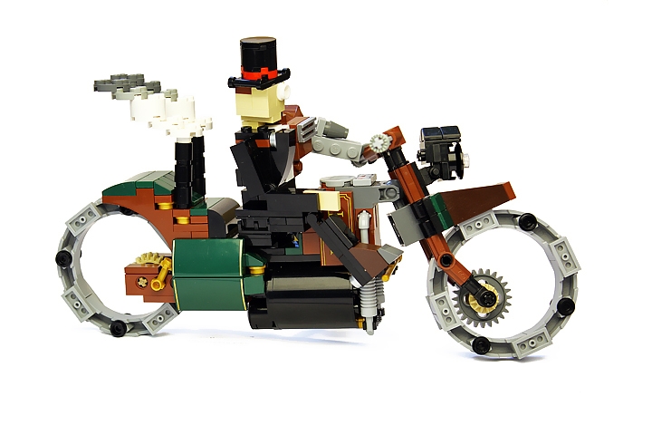 LEGO MOC - Steampunk Machine - Пароцикл Томаса Уатта (миниленд): Безосевые колеса с кованным стальным ободом на электродинамической подвеске<br />
выбирались из любой переделки, будь то камни или зыбучий песок.<br />
<br />
