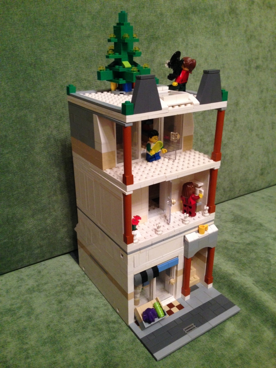 LEGO MOC - Новогодний Кубик 2014 - Прекрасный Новогодний Домик): Вот сам дом,выполненный во французском стиле.Мы видим людей,все они радуются празднику.