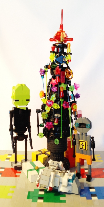 LEGO MOC - Новогодний Кубик 3015 - Дед мороз 3015: Гуманойдикус и Железякус соорудили свою елку из различных шин и колес.