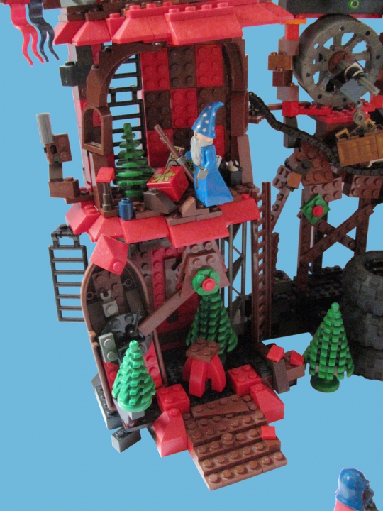 LEGO MOC - Новогодний Кубик 3015 - Фабрика елочных игрушек V112-184-221PHD: Это главная башня фабрики, тут роботы следят за производственным процессом, однако сейчас они празднуют Новый Год около елки, а тем временем Дед Мороз Синий Нос проникает в башню и оставляет роботам подарки 