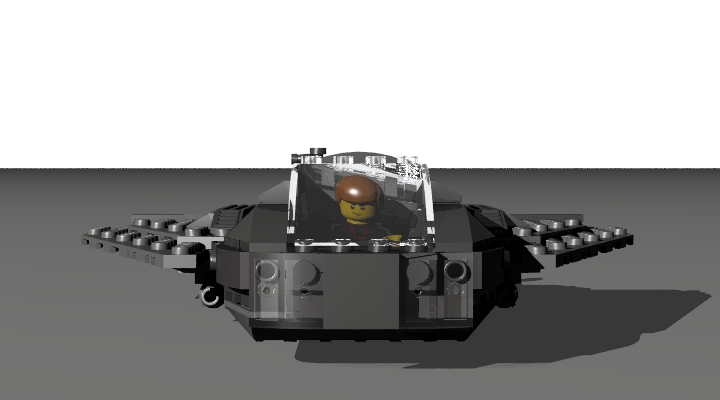 LEGO MOC - Погружение - Подводный аппарат SM-4: Строго спереди. Спереди на бампере находятся две 'фары' для освещения пути под водой. Под крыльями находятся небольшие торпеды, которые предназначены для отбивания от угроз. И да, не обращайте внимания на 'размазанного' по стеклу пилота, просто у этого стекла какая-то странная оптика.