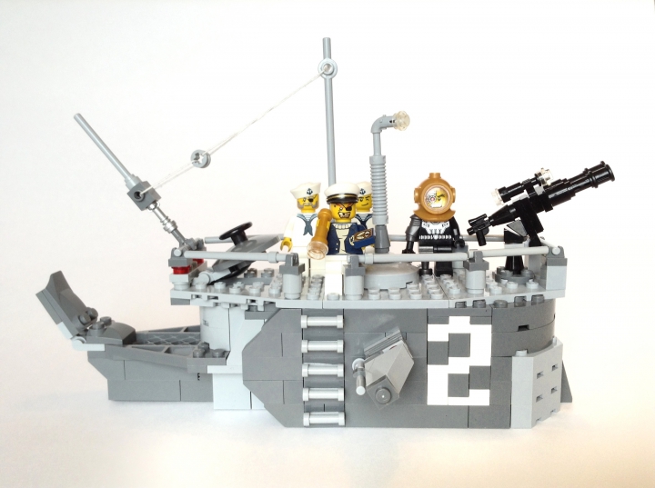LEGO MOC - Погружение - Погружение 1925.: <p>Бесстрашная команда Капитана Сола и башня дизельной подводной лодки в стиле дизельпанка. <br />
</p><br />
-<br />
Дизельпанк (англ. Dieselpunk) — развивающийся жанр фантастики, производный от киберпанка, описывающий мир, базирующийся на технологиях уровня 20-х — 50-х гг. XX века (период с Первой мировой войны по Вторую мировую войну), а также зарождающаяся субкультура, сочетающая в себе эстетику того времени с постмодернистскими технологиями и чувствами.(c) Вики