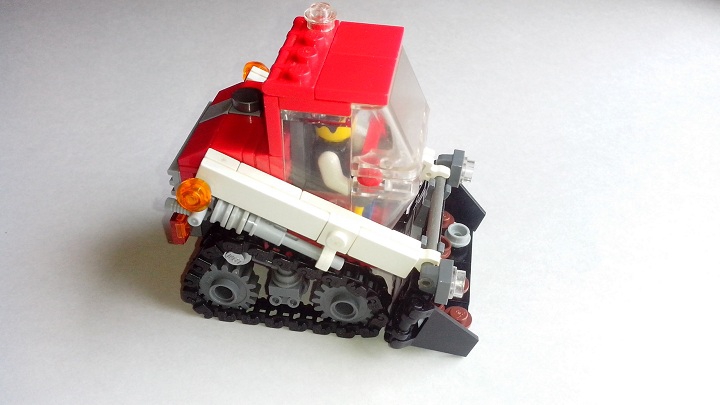 LEGO MOC - Битва Мастеров 'В кубе' - Lego Bobcat: Ковш приводится в движение двумя пневматическими цилиндрами, расположенными над гусеницами