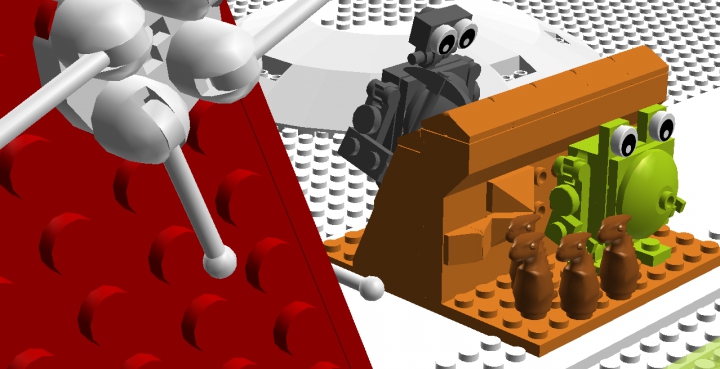 LEGO MOC - Новогодний Кубик 2016 - Валли — Дед Мороз: Потом Док проверит, не грязный ли подарок, на котором робот раскалывает камень, потому что робот хочет найти инопланетян, а они в это время как раз за камнем. Там идут четыре динозаврика и стоит кто-то непонятный. Потом Валли всё это упакует и разнесёт подарки.