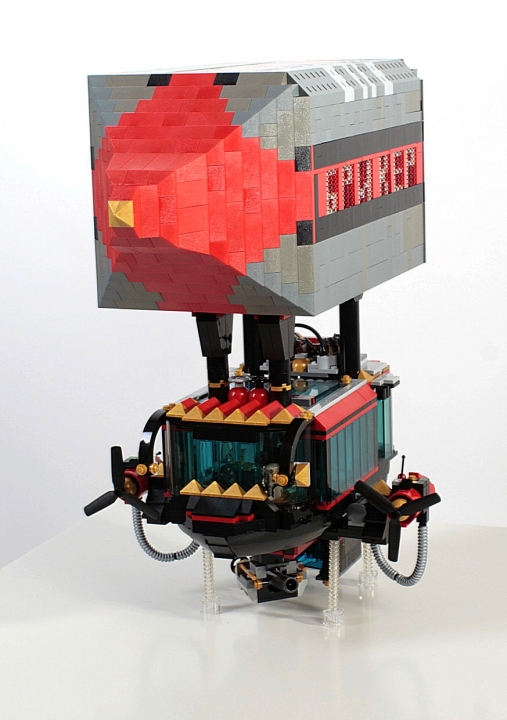 LEGO MOC - Мини-конкурс 'Битва Дирижаблей' - Игла: Дамы и господа, приглашаем Вас прокатиться на нашем замечательном дирижабле!<br />
<br />
Комфортно, быстро и безопасно мы доставим Вас в любую точку земного шара!<br />
<br />
Данный дирижабль имеет замкнутую систему нагрева газа. Изначально, газ поступает в баллон через две передние черные трубы, а затем после остывания, он оседает и поступает в нижнюю часть баллона, где затем через две задние трубы снова попадает в нагревательные камеры, расположенные в передней части кабины на крыше. Все четыре черные трубы также являются опорами для баллона.