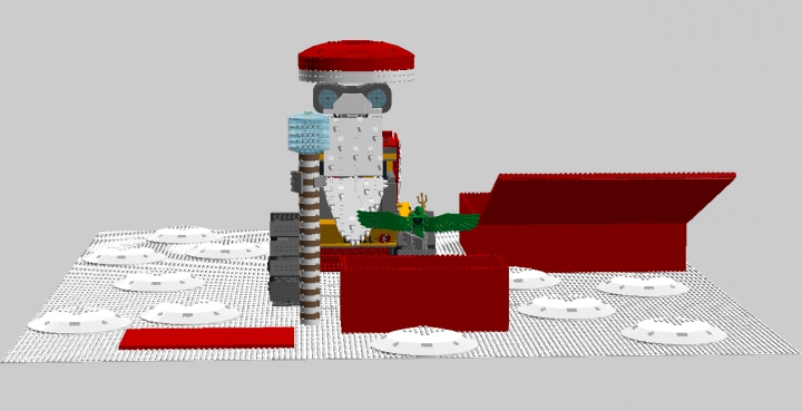 LEGO MOC - Новогодний Кубик 2016 - Валли — Дед Мороз: Вид спереди. В одной руке у Валли посох Деда Мороза, а в другой руке игрушечный человек-киви с крыльями.